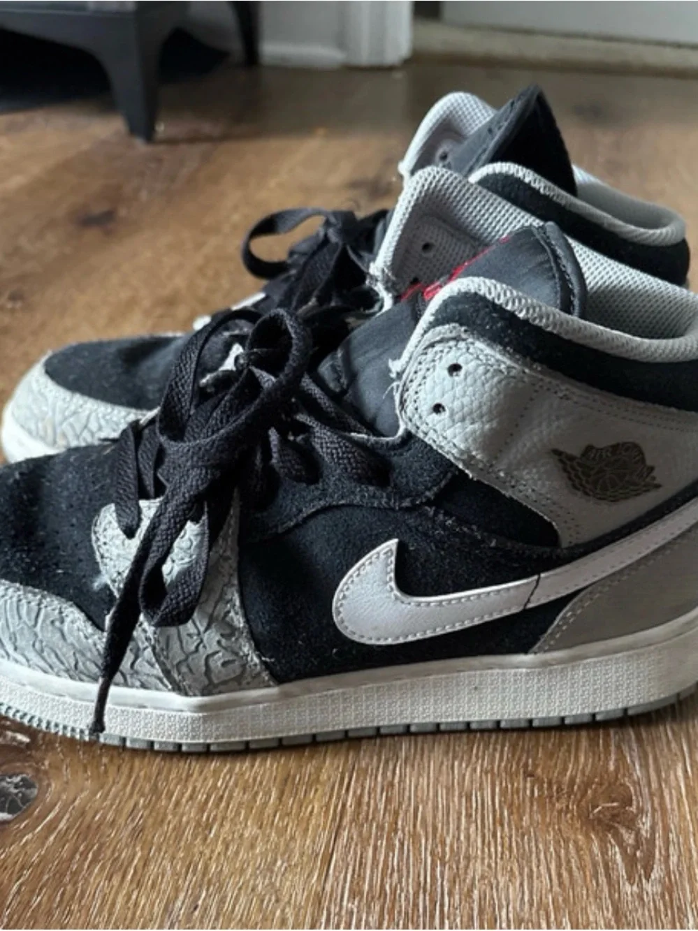 Jordan Black, Gray, and Red High-Top Sneakers